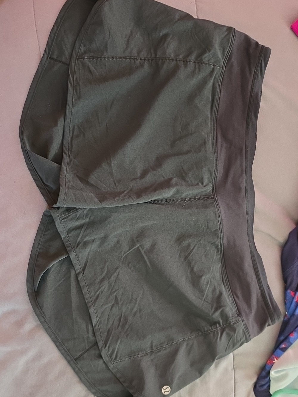 Black Lululemon Shorts with Zippered Pocket and Smooth Finish